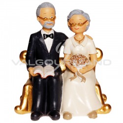 Couple de Seniors sur fauteuil doré H. 15cm - pièce en stock